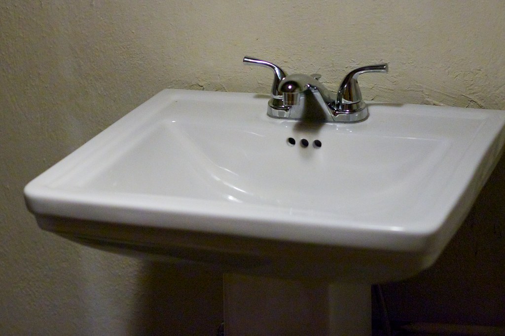 Clean bathroom sink faucet installation
